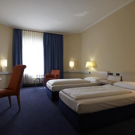 Intercityhotel Stuttgart Estugarda Quarto foto